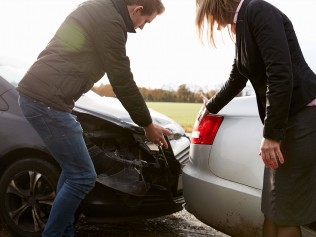 Clients pointing at Auto Damage